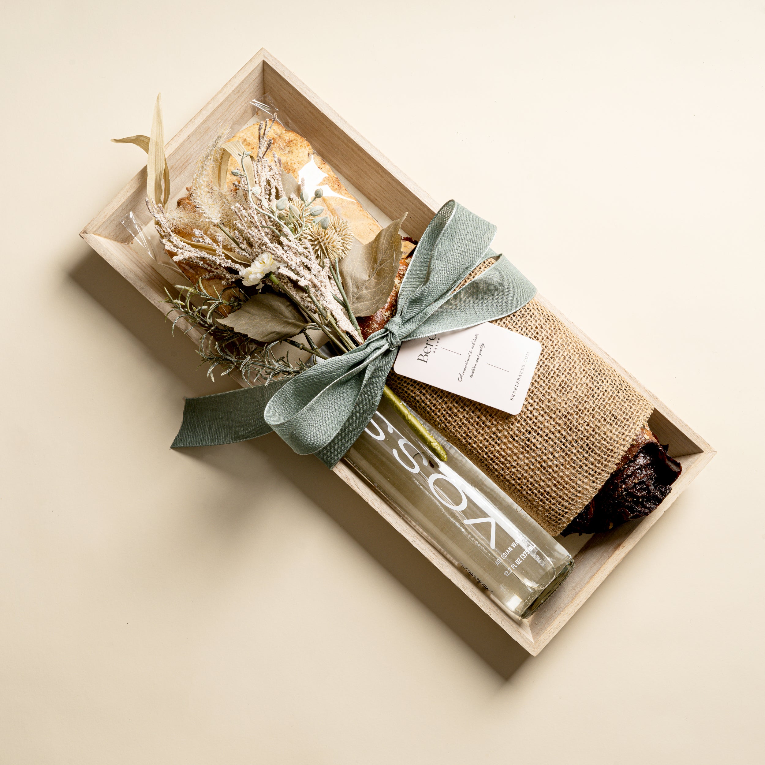 Rustic Wooden Cake Tray with Babka, Biscottis and Voss Water