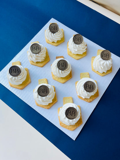 Dreidel Custard and Cream Cookies with Signature Berel’s Bakes Coin