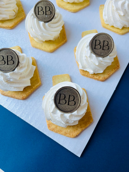 Dreidel Custard and Cream Cookies with Signature Berel’s Bakes Coin