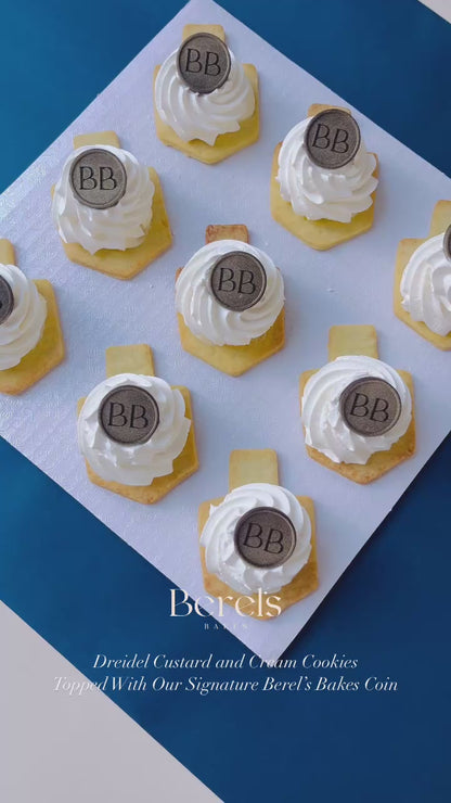 Dreidel Custard and Cream Cookies with Signature Berel’s Bakes Coin